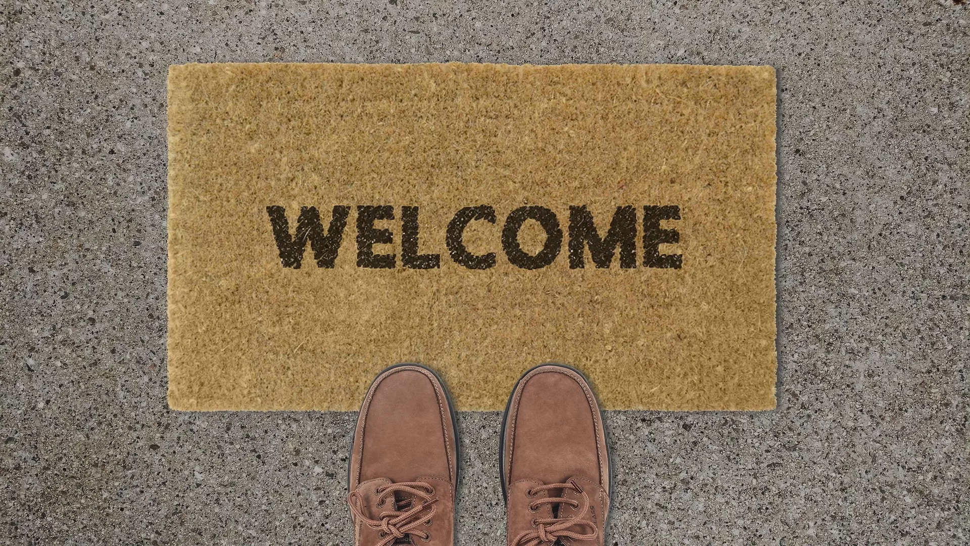 Fußmatte mit Welcome und zwei Schuhen