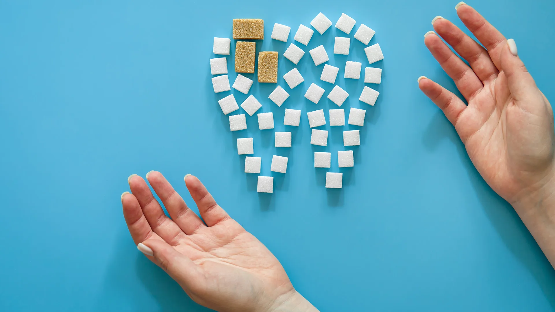 Ein Zahn aus Würfeln zusammengestellt.