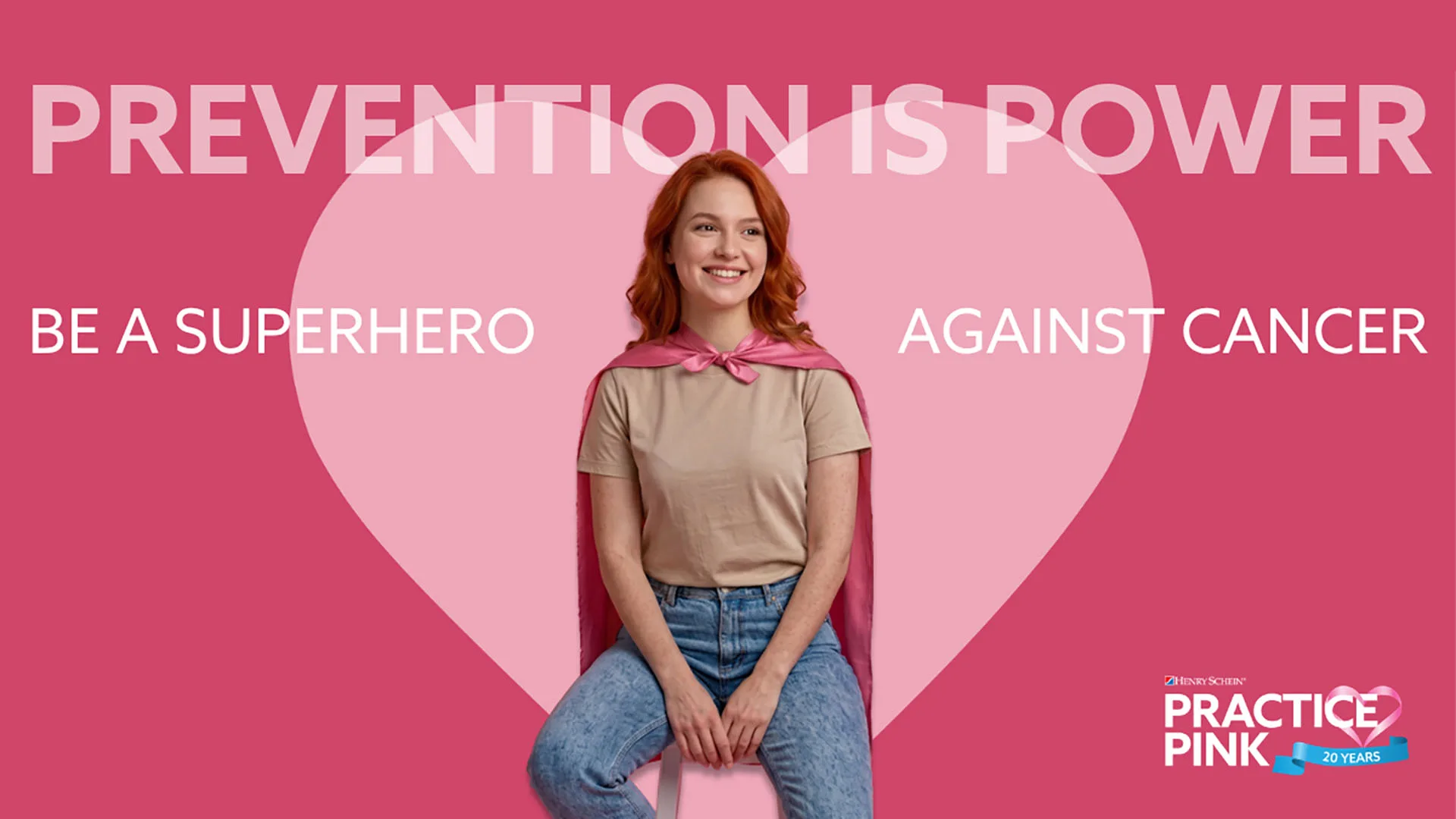 pinker Hintergrund und ein rosa Herz, eine Frau sitzt davor.