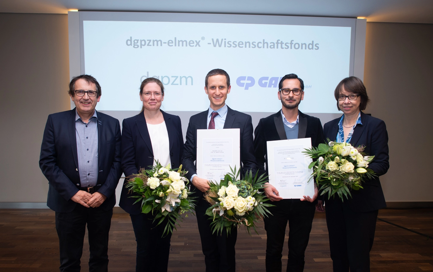 V.l.n.r.: Prof. Dr. S. Zimmer (Präsident der DGPZM), Prof. Dr. N. Schlüter, ZA B. Luka, Dr. K. Schoilew (Förderempfänger), Dr. M. von Schmettow (CP GABA).