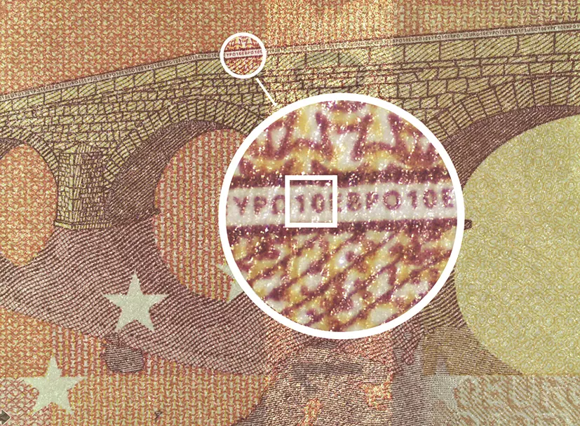 Abb. 7: Triage-Sehtest für Lupen mit einer 10-€-Banknote: Die Buchstabenreihe
im Geländer der Steinbrücke enthält wiederkehrend die Zahl „10“, sie muss mit
der Lupenbrille in entsprechender Arbeitsdistanz und mit OP-Licht erkannt
werden. Wer die „10“ sicher lesen kann, liegt mit hoher Wahrscheinlichkeit in
der besseren Hälfte der Peergroup, wer sie nicht entziffern kann, in der
schlechteren Hälfte [41].