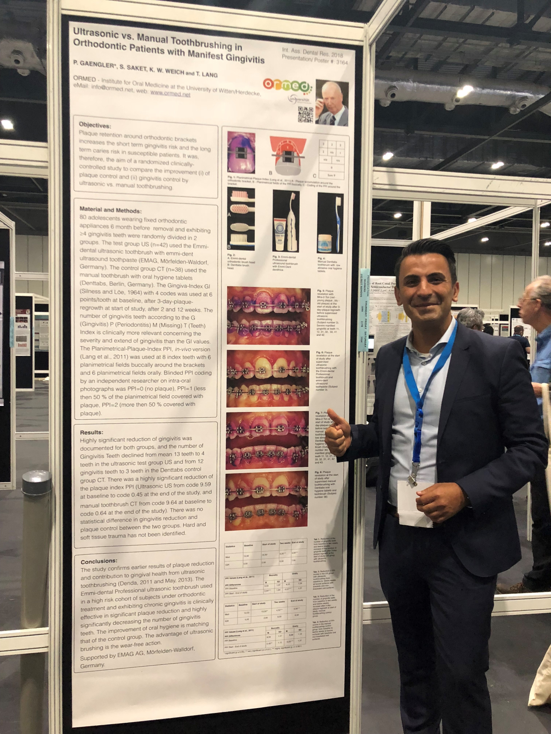 emmi®-dent-Geschäfsführer Cüneyt Emekci bei der Studienpräsentation in London.
